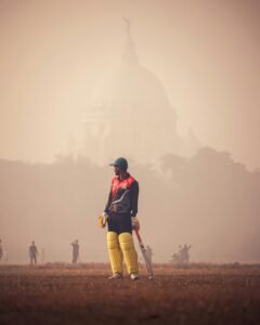 free photo of cricket player under fog