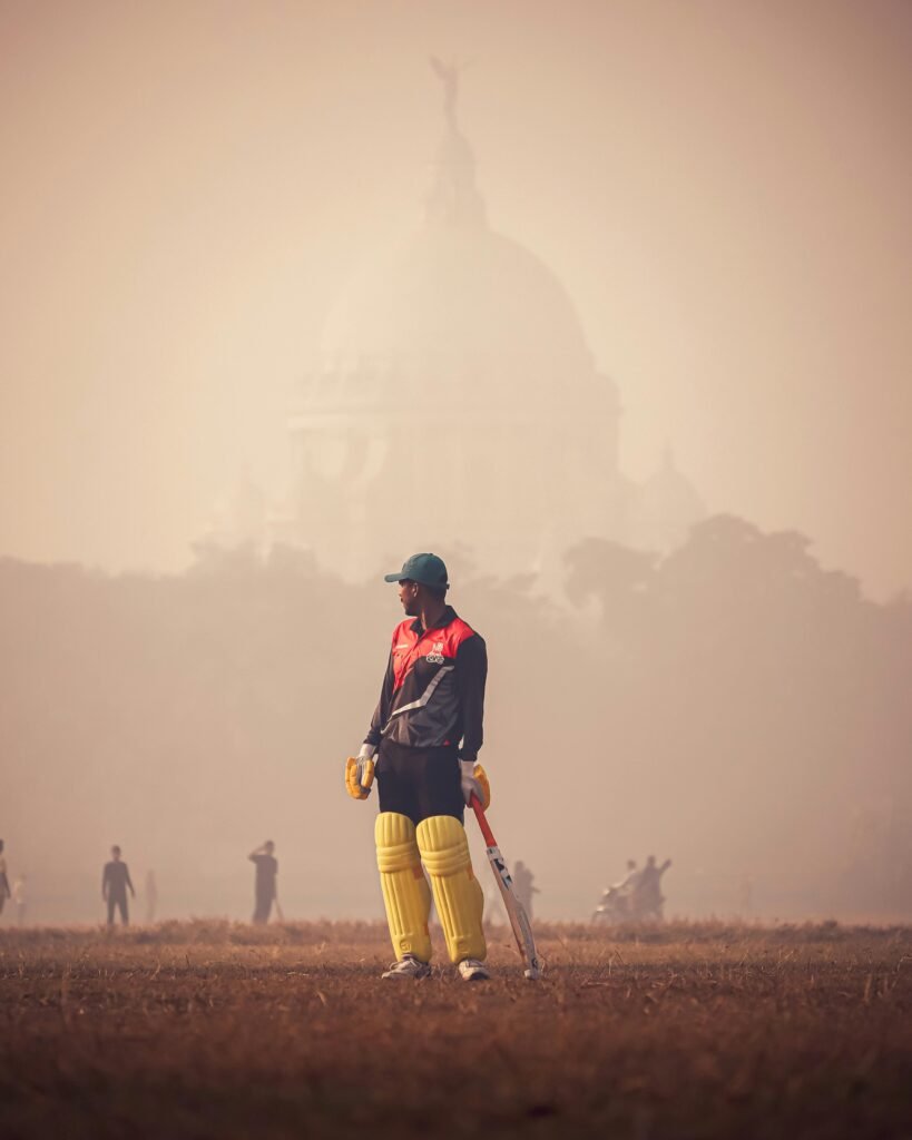 free photo of cricket player under fog